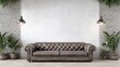 © Alfath - Brown leather Chesterfield sofa in a minimalist interior with plants and exposed brick wall.
