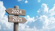 © Din Nasahrudin - Wooden sign saying goodbye to the old year 2024 with welcome the new year 2025. New year symbol and business concept.