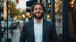 © NaphakStudio - confident man in suit stands outside modern building, smiling warmly. urban setting features blurred cars and trees in background, creating lively atmosphere.