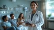 © Iurii - Female doctor in examination room with young couple reviewing health information