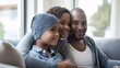 © Kenny - African family bonding on cozy sofa at home