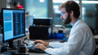 © fotofabrika - Researcher analyzing data on computer in laboratory environment during daylight hours