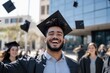 © Milos - A joyful graduate wearing a cap and gown, celebrating success and achievement among peers, embodying the excitement and pride of graduation day.