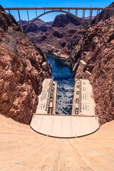 Wall Mural - A large body of water is reflected in the side of a mountain