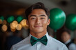© Viktoriya - A lifestyle image of a person adjusting a green bow tie in a festive setting. Features St. Patrick’s Day decor in the background, with a focus on the vibrant accessory and joyful atmosphere.