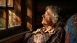 © yusufadi - Golden Hour Serenity: An Elderly Woman Resting by a Window