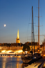 The view of atlantic coast walled city historical old town of Saint Malo at night . Brittany ,France .