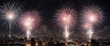 © Kachaphot - New Year fireworks exploding in the city at night,  skyscrapers,  celebration