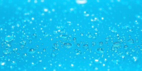 Glistening water drops on a soothing blue background, fresh, aqua, blue