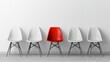 © Mikki Orso - A striking red chair among minimalistic gray office chairs against a white background