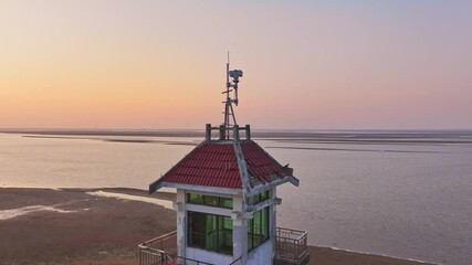 Wall Mural - lifeguard tower at sunset