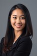 © Derek Brumby - Professional Portrait of a Young Asian Woman with Long Hair in Business Attire
