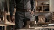 © Palugada - Close up of businessman standing in office and looking at model of house