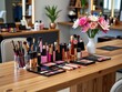 © SR Creative Idea - Makeup Artistry Cosmetics Brushes and Flowers on Wooden Table