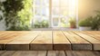 © อาริษา วันดี - Rustic Wooden Table Surface with Soft Natural Light and Greenery Background for Cozy Indoor Decor or Product Display in a Bright Room