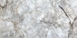 © Gular - Background featuring the texture of natural stone granite tiles, displaying a white marble finish that enhances the overall aesthetic appeal and elegance of the surface.
