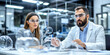 © AnuStudio - A focused discussion between two scientists in a modern lab, surrounded by glass equipment, emphasizing collaboration and innovation.