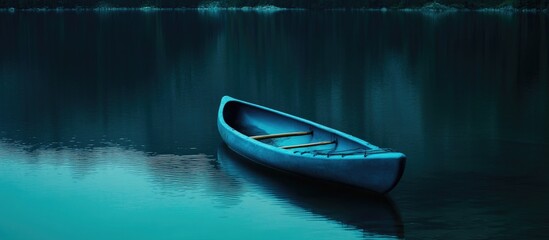 Fototapete - Serene blue kayak anchored on a tranquil lake surrounded by still water and reflections in a picturesque natural setting