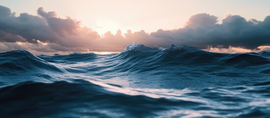 Aufkleber - Serene ocean waves at sunset with dramatic clouds reflecting warm light and creating a tranquil coastal atmosphere.
