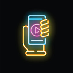 Canvas Print - Neon sign icon of a hand holding a smartphone playing a video, on a black background