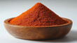 © dragonflypor9 - Bright red spice powder displayed in a wooden bowl offers a vibrant touch to culinary creations. Ideal for showcasing textures and ingredients in food photography
