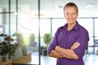 © BillionPhotos.com - Confident young professional business man standing in modern office