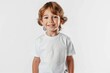 © Ilia - Smiling young boy in white t-shirt