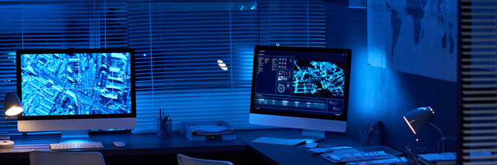 Aufkleber - Header of workplace of security officers with group of computer monitors with graphic data on screens in spacious military office