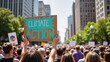 © Irina - Protester holding 'Climate Action' sign at citywide climate march with crowd