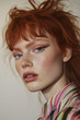 © Lieze - Natural Beauty Portrait of Young Woman with Wavy Red Hair, Freckles, and Serene Expression in Minimalist Studio Setting