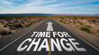 © watz - Empty highway with Time for Change painted on the road..