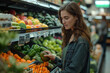 © PhotoProAD - A woman is shopping for fruits and vegetables in a grocery store