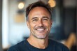 © At My Hat - Smiling mature man with graying hair. Perfect for ads promoting health, happiness, or aging gracefully.