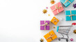 © นิโลบล ชํานาญธรรม - Colorful gift boxes and shopping cart create festive shopping scene. Perfect for promotions and holiday sales