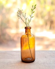 Wall Mural - Vintage amber bottle with delicate twigs