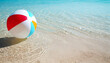© ArtBackground - Beach ball on clear water sea with sunlight tropical summer background