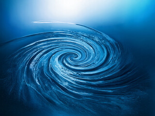 Leinwandbilder - A mesmerizing spiral of deep blue water, swirling with hypnotic energy.  The vortex evokes a sense of depth and mystery.