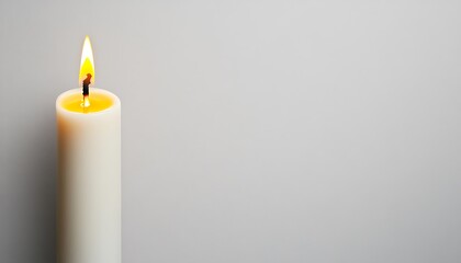 Canvas Print - Lit white candle on grey background, copy space.