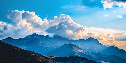 Wall Mural - Majestic clouds gently blanket the mountains, creating a stunning contrast in the landscape where the mountains meet the sky. The clouds enhance the beauty of the mountains in this breathtaking scene.