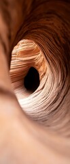 Canvas Print - Swirling sandstone formations in a desert canyon, creating a tunnel-like effect.