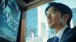© bephoto - 金融街のオフィスで市場分析に集中する日本人男性ファイナンシャルアナリスト