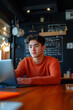 © Василь Тігай - Focused Young Man Working on Laptop