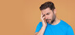 © Volodymyr - Sad man got migraine. Man with strong headache. Stressed, tired man from headache. Headache, tiredness and stress, migraine. Headache pain concept.