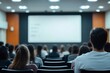 © Imagentive - Blurred Seminar Audience Watching Blank Screen