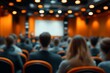 © Imagentive - Blurred Conference Hall Audience with Projector