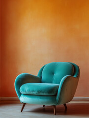 Wall Mural - Teal armchair against an orange wall