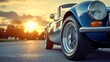 © Enggal Pitoyo - Classic car at sunset on road.