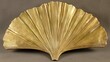 © PB Studio - detailed shot of a ginkgo leaf, highlighting its unique fan shape and golden hue. |
