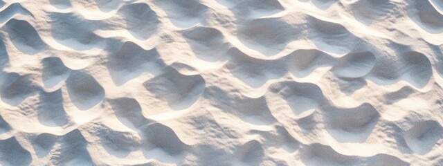 Aufkleber - White sand texture background. Close-up view of beach sand with natural light and shadows.