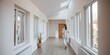 © Chalermrach - Woman in casual clothing walking through modern and spacious house with large windows, room, architecture